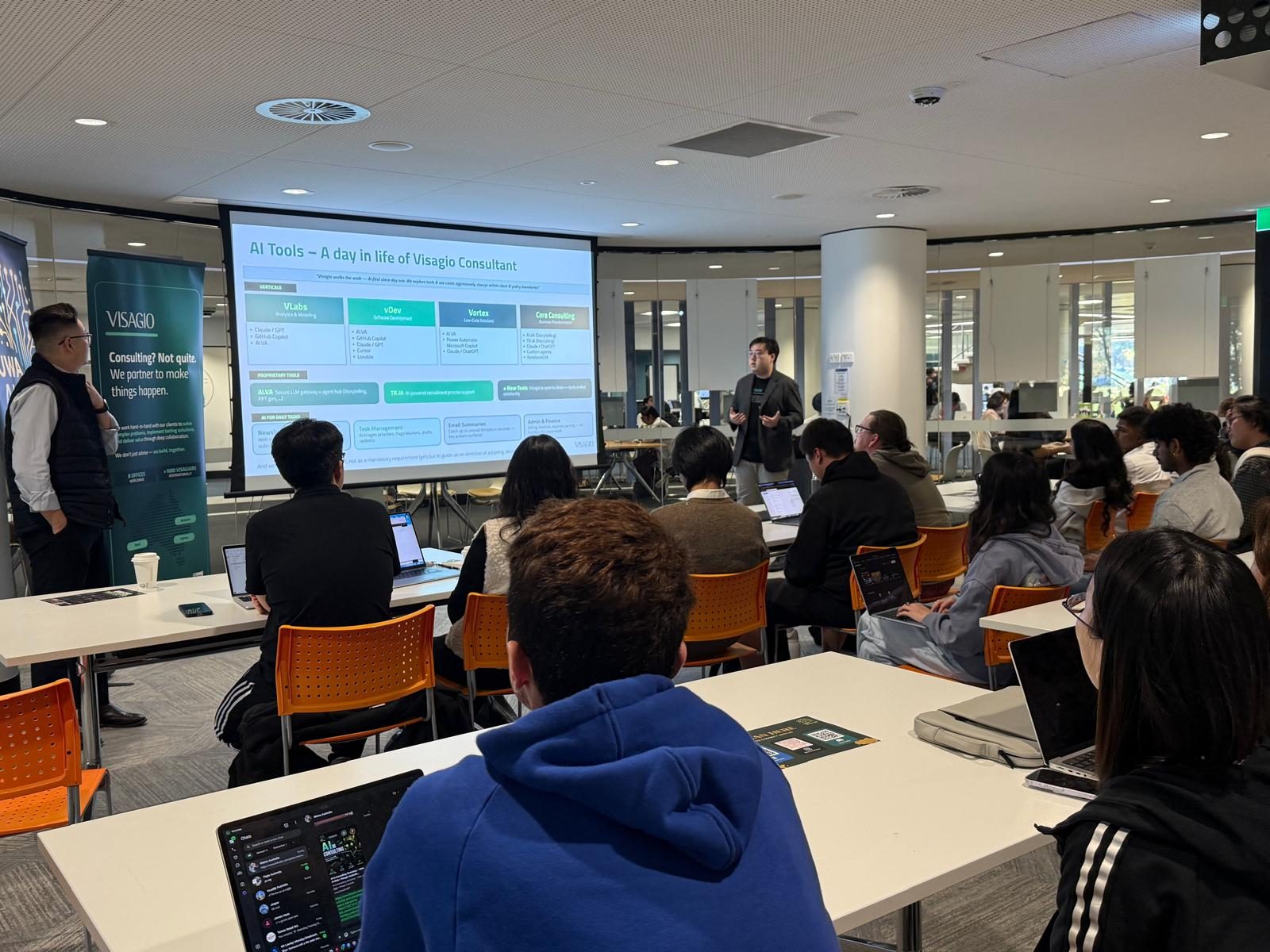 Students working an AI-assisted business case at the Visagio workshop